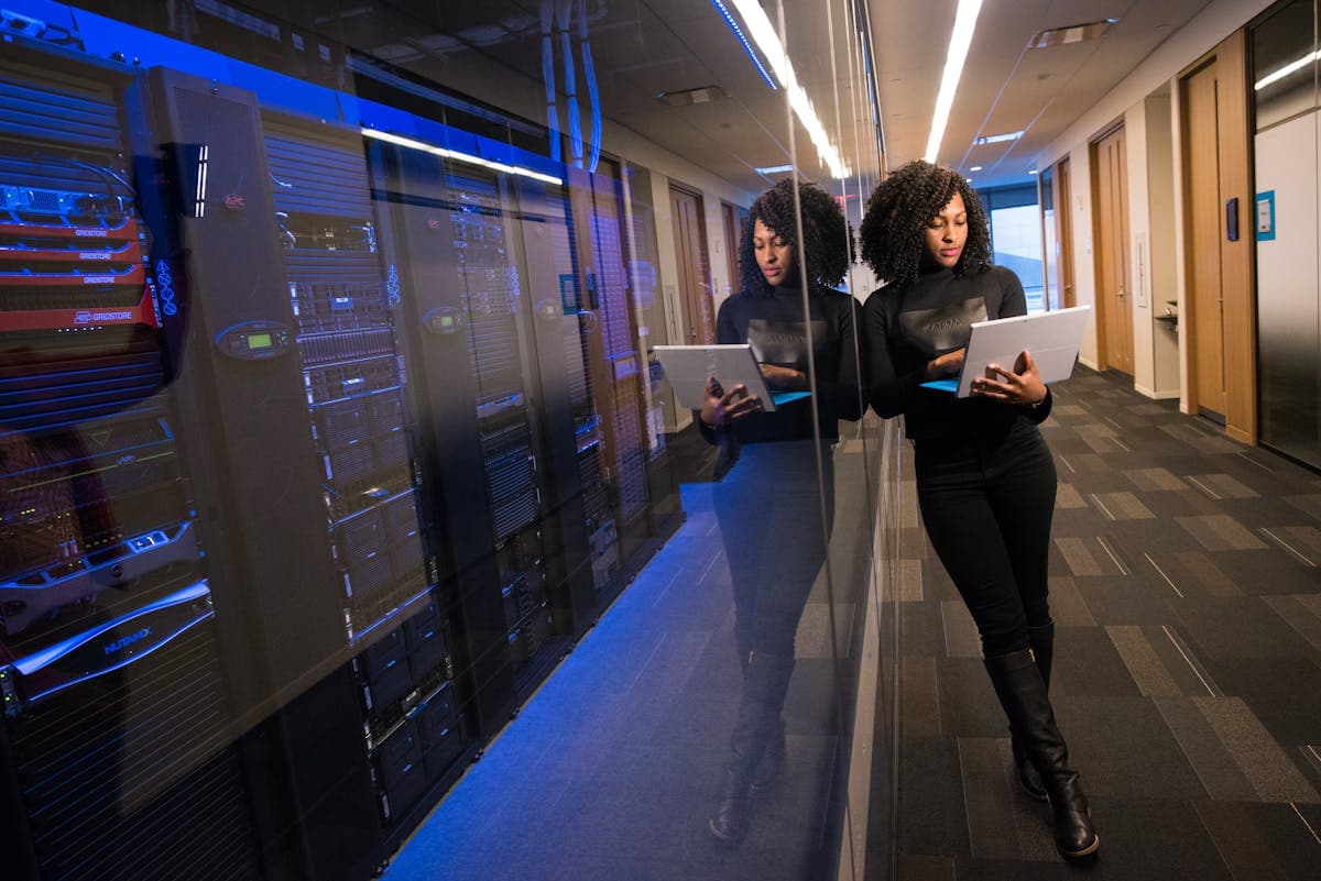 Data center with servers and monitoring screen — symbolizing control over AI agents in production